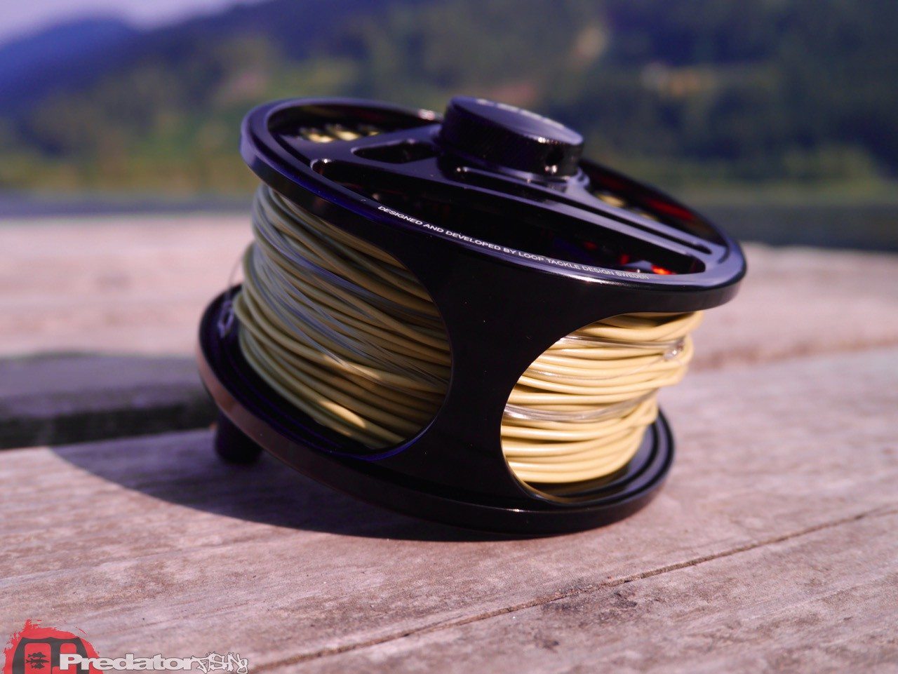 Loop Evotec G4 Fliegenrolle